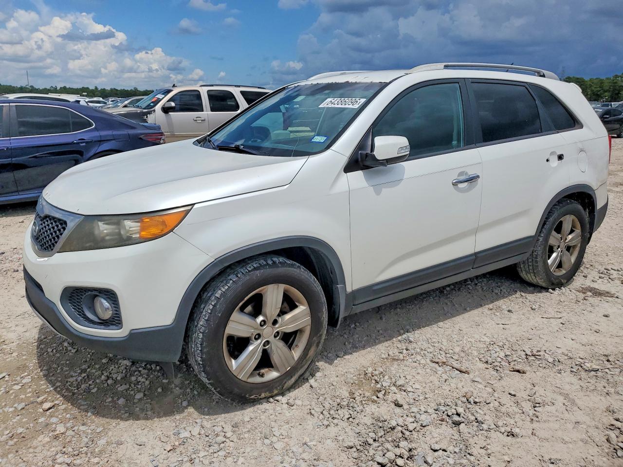 2012 Kia Sorento EX, VIN 5XYKU4A24CG234189 — Бок