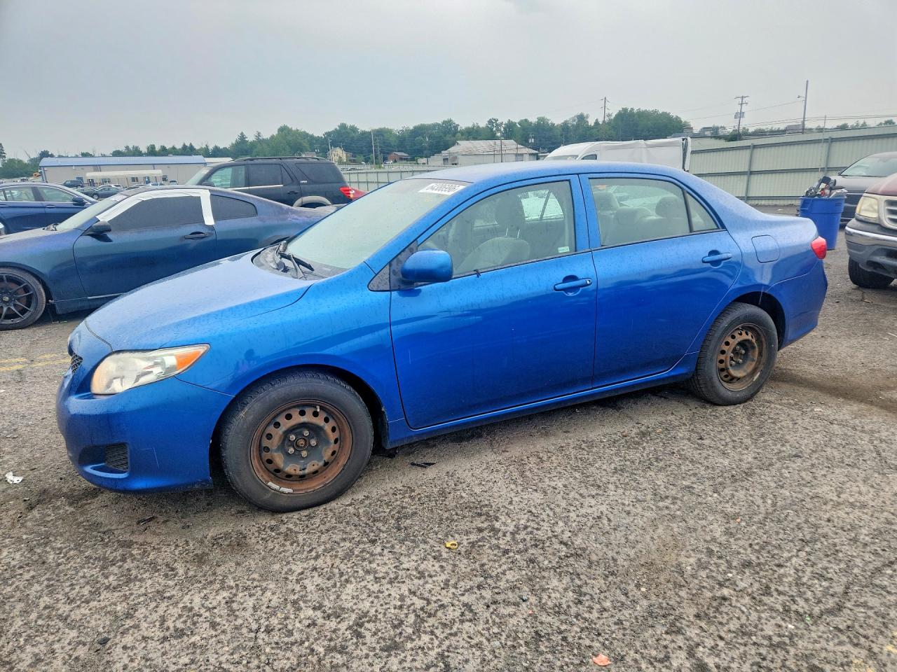 2009 Toyota Corolla LE, VIN 1NXBU40EX9Z085477 — Minor dents and scratches