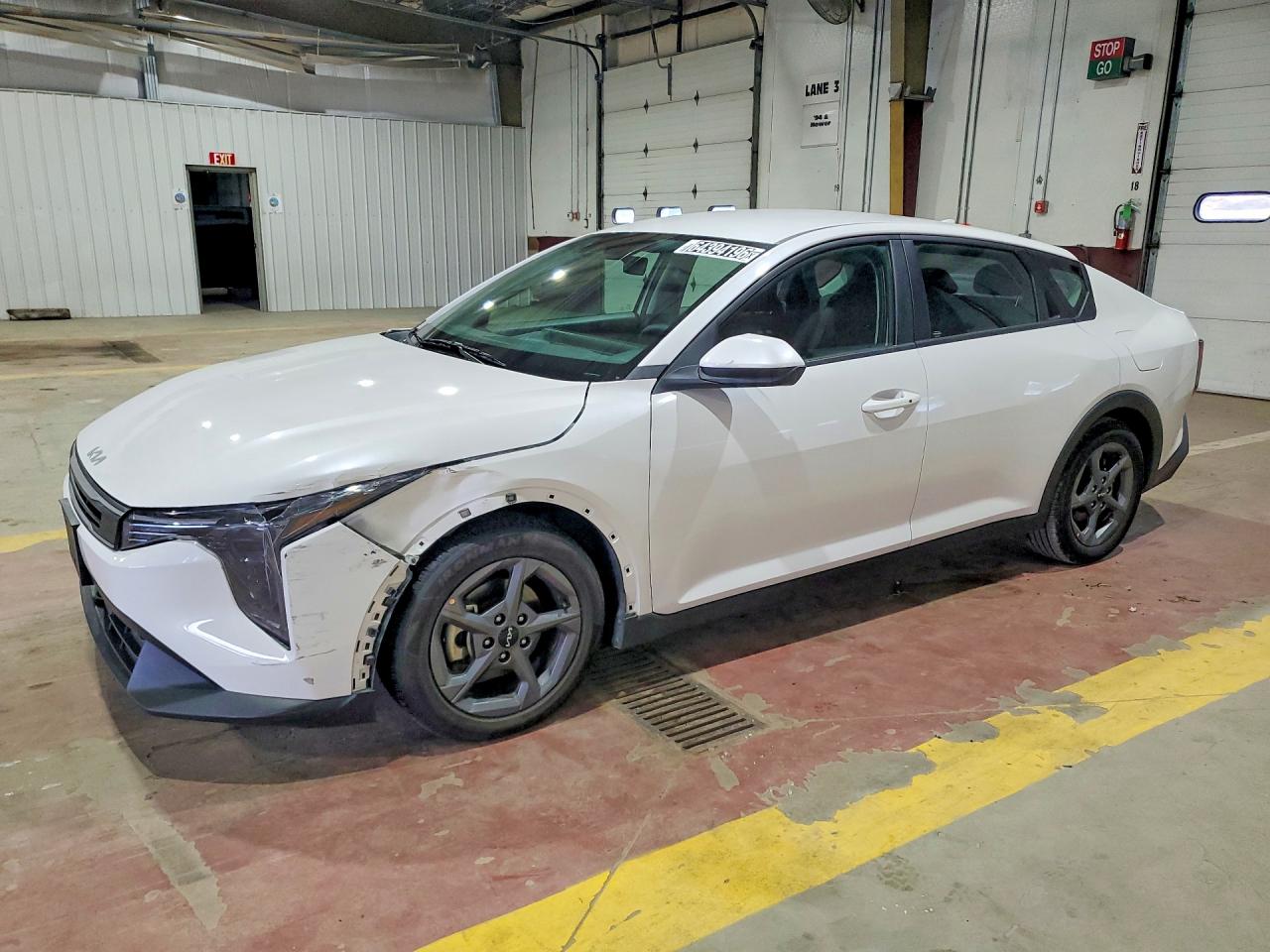 2025 Kia K4 LXS, VIN 3KPFT4DE9SE111316 — Бок
