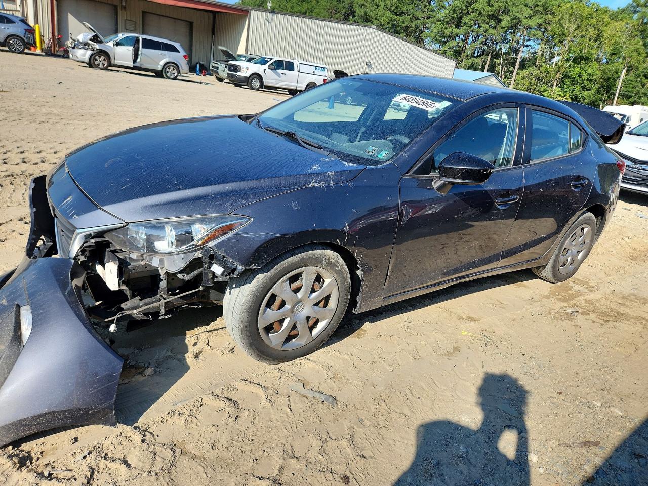2014 Mazda 3 i SV, VIN JM1BM1T71E1155976 — Зад