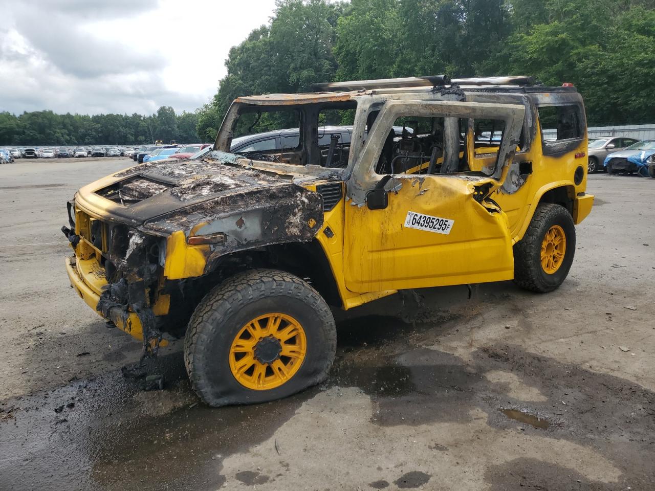 2003 Hummer H2, VIN 5GRGN23U33H142082 — Burn