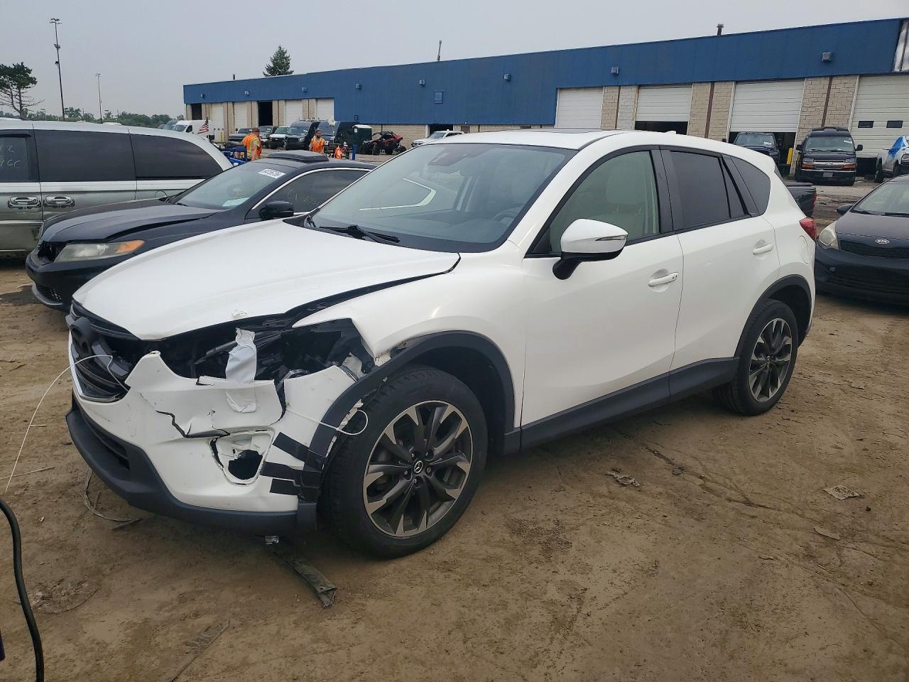 2016 Mazda CX-5 Grand Touring, VIN JM3KE4DY4G0839619 — Front end
