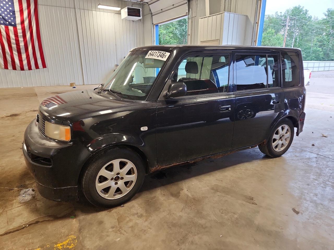 2005 Scion xB, VIN JTLKT334750182081 — Бок