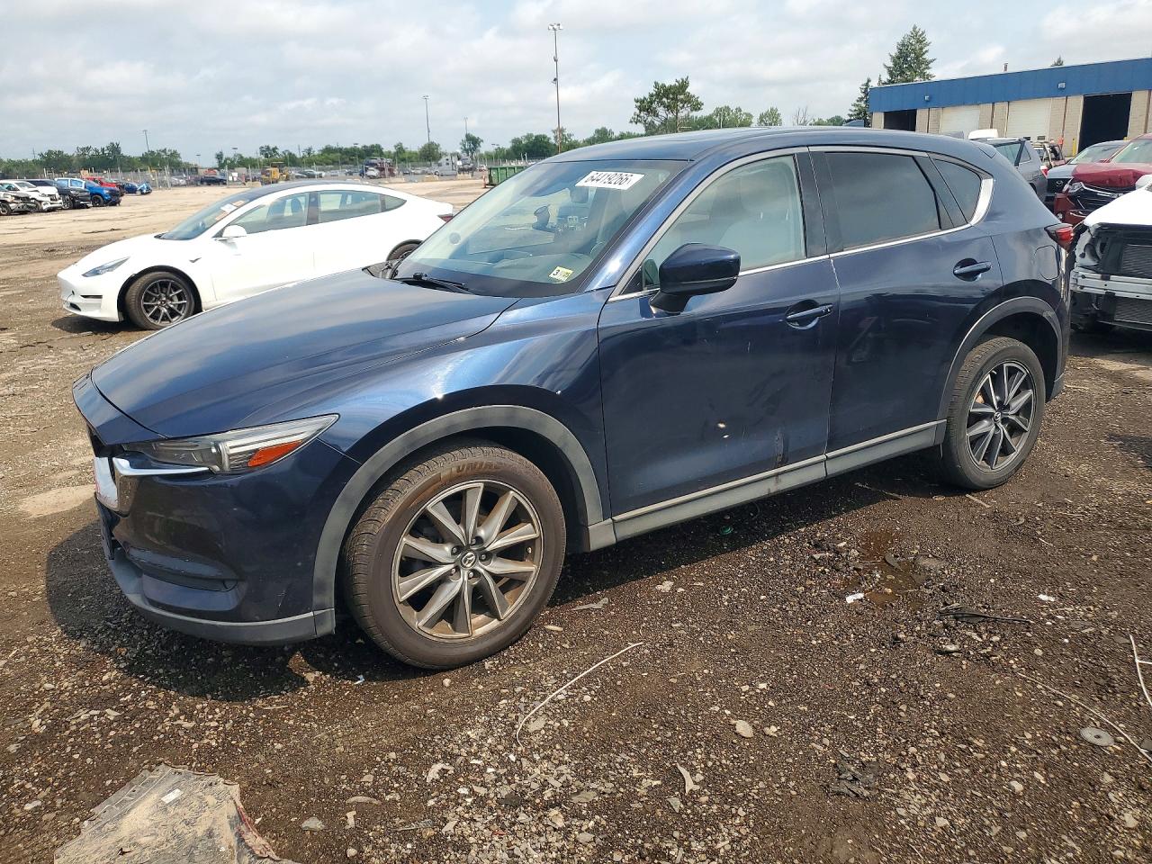 2017 Mazda CX-5 Grand Touring, VIN JM3KFBDL6H0112098 — Rear end