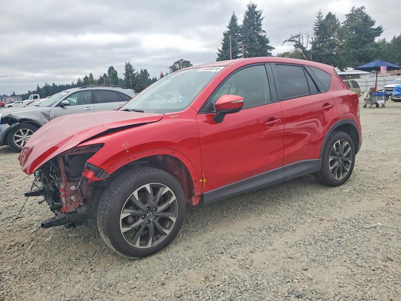 2016 Mazda CX-5 Grand Touring, VIN JM3KE4DY6G0895027 — Front end
