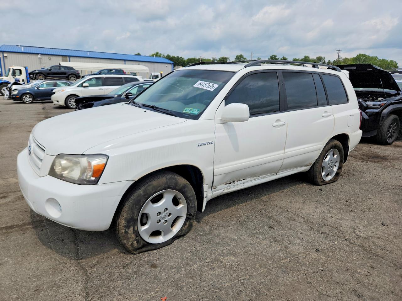 2006 Toyota Highlander w/3rd Row, VIN JTEEP21A160154998 — Side