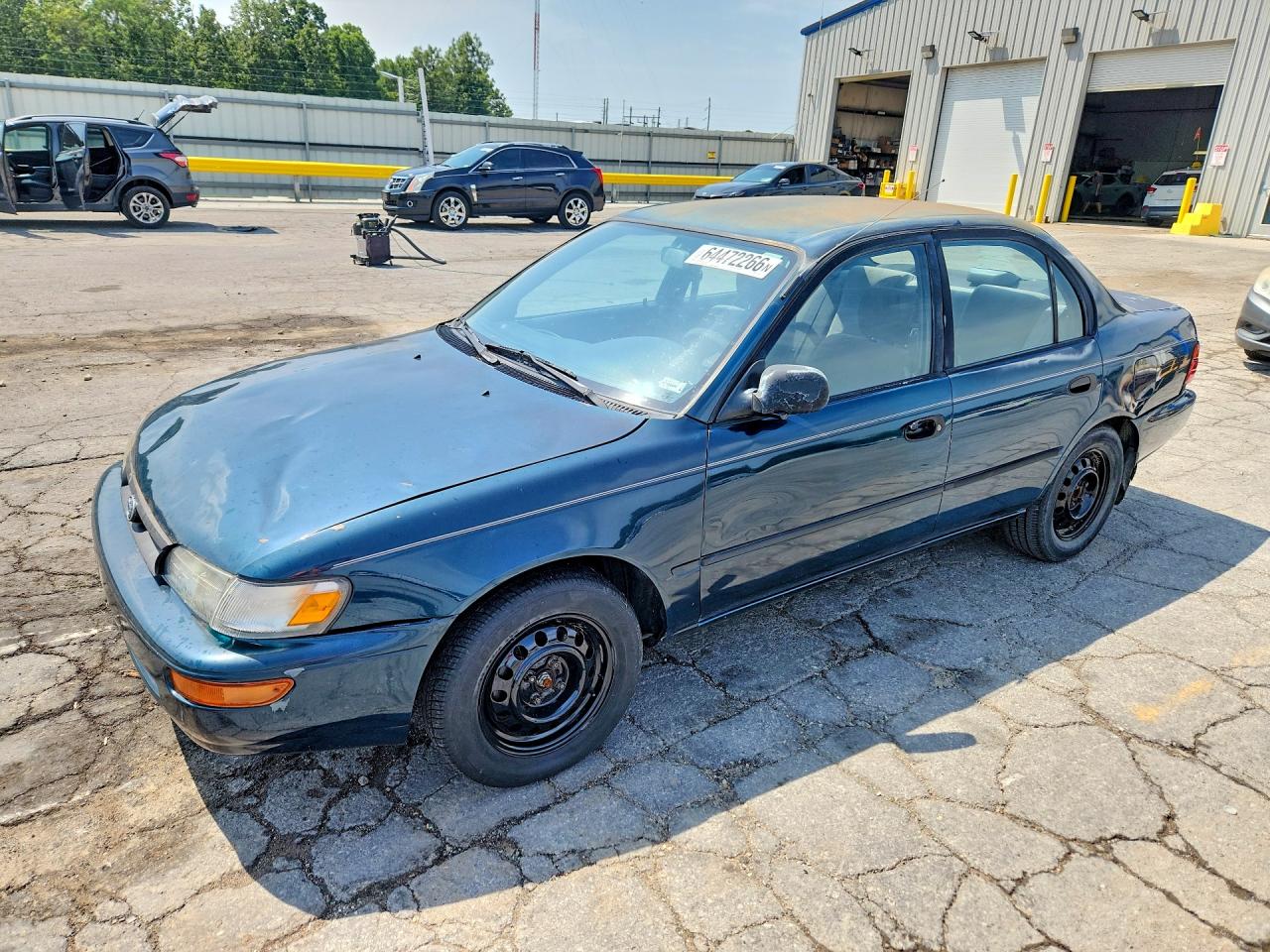 1994 Toyota Corolla Deluxe, VIN 1NXAE09B9RZ135070 — Front end