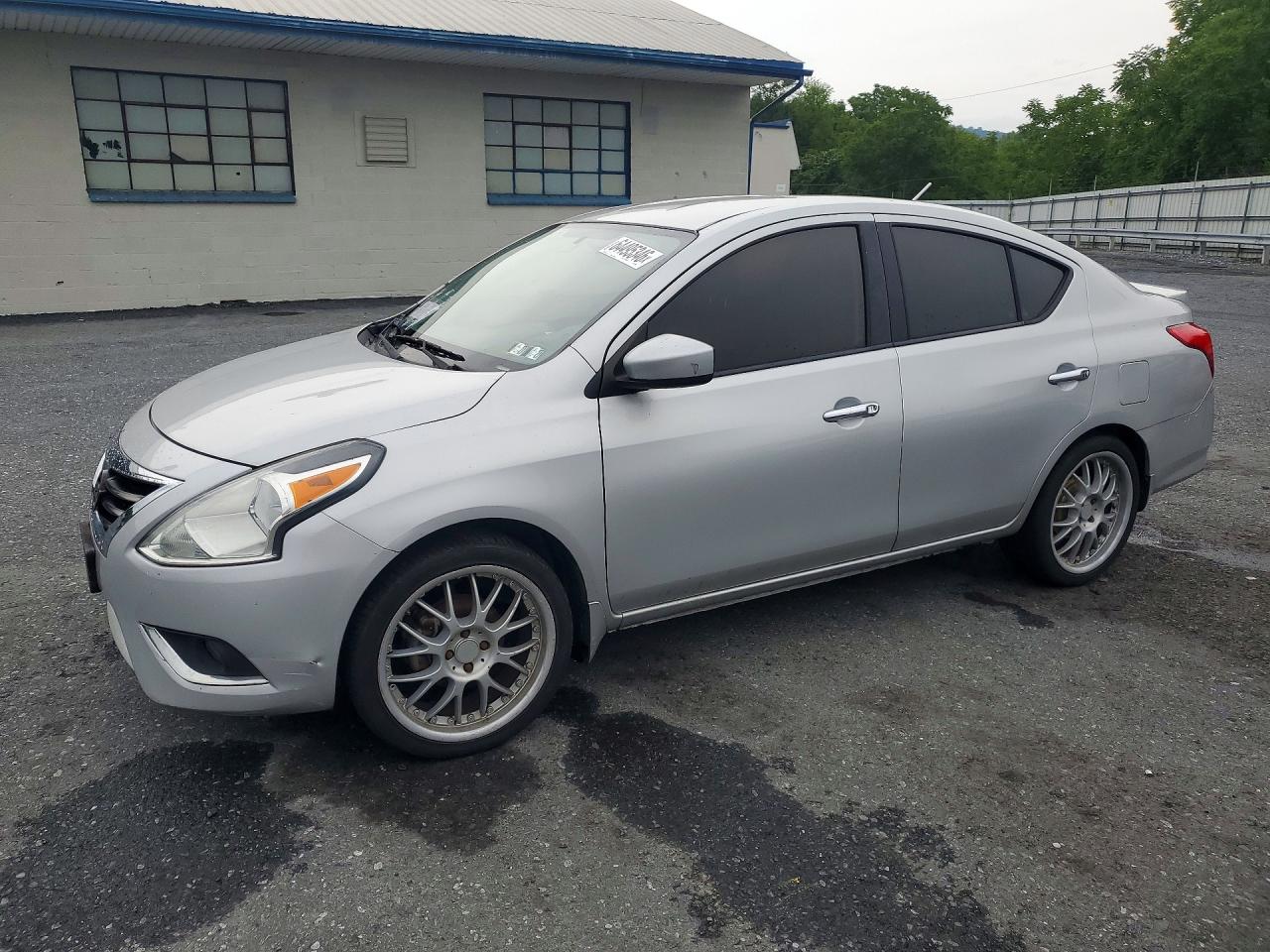 2016 Nissan Versa S Plus, VIN 3N1CN7APXGL836661 — Бок