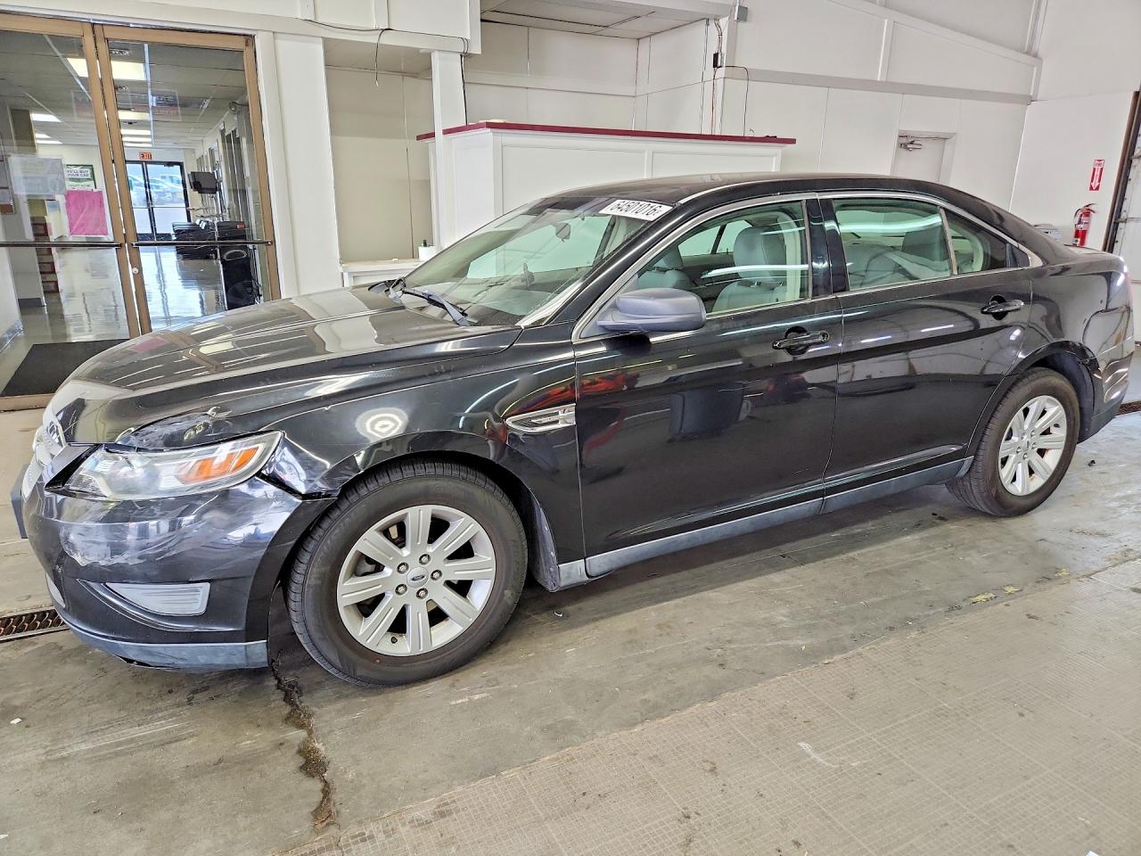 2011 Ford Taurus SE, VIN 1FAHP2DWXBG107856 — Front end