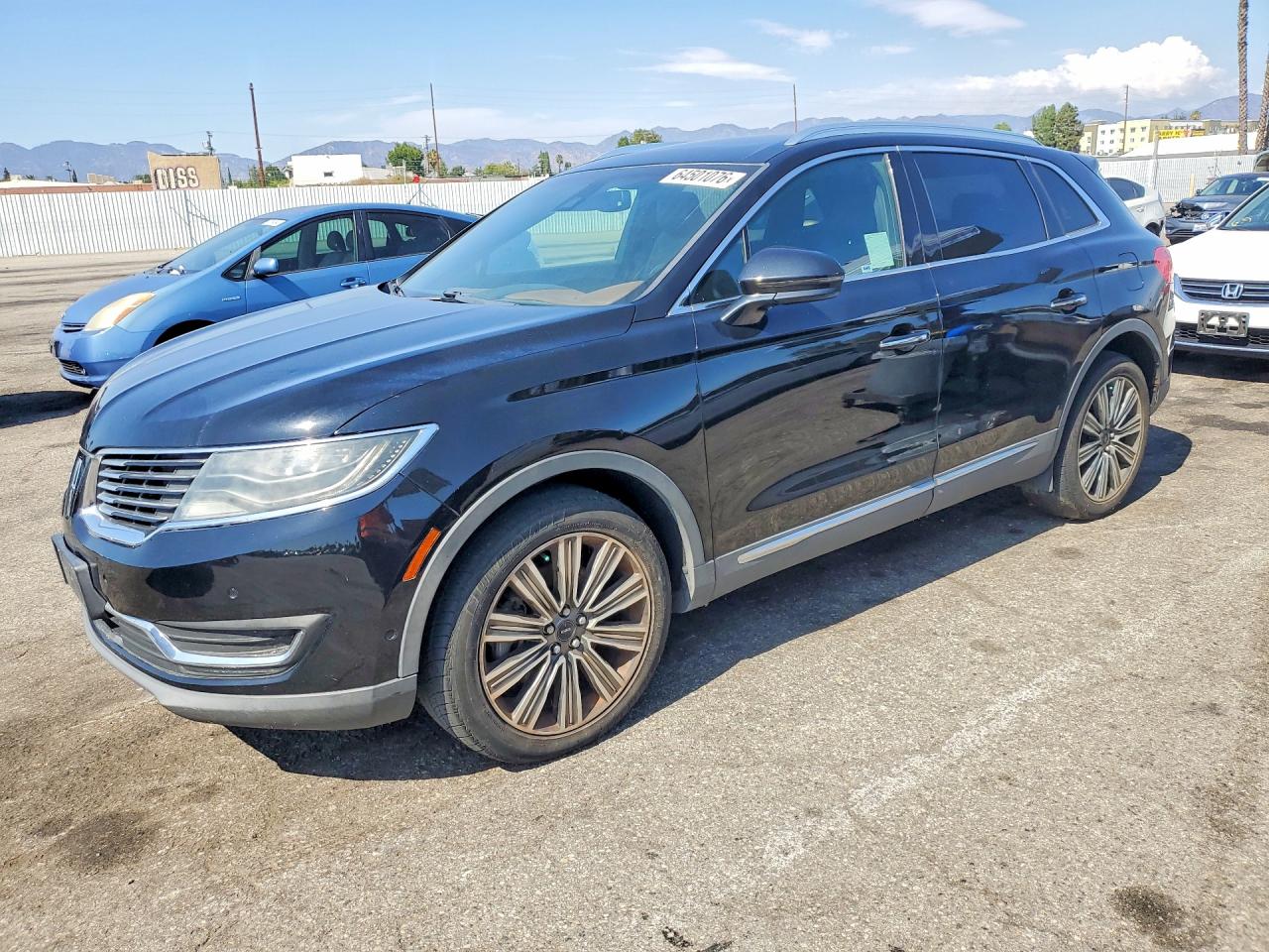 2016 Lincoln MKX Black Label, VIN 2LMPJ9JP1GBL74931 — Minor dents and scratches