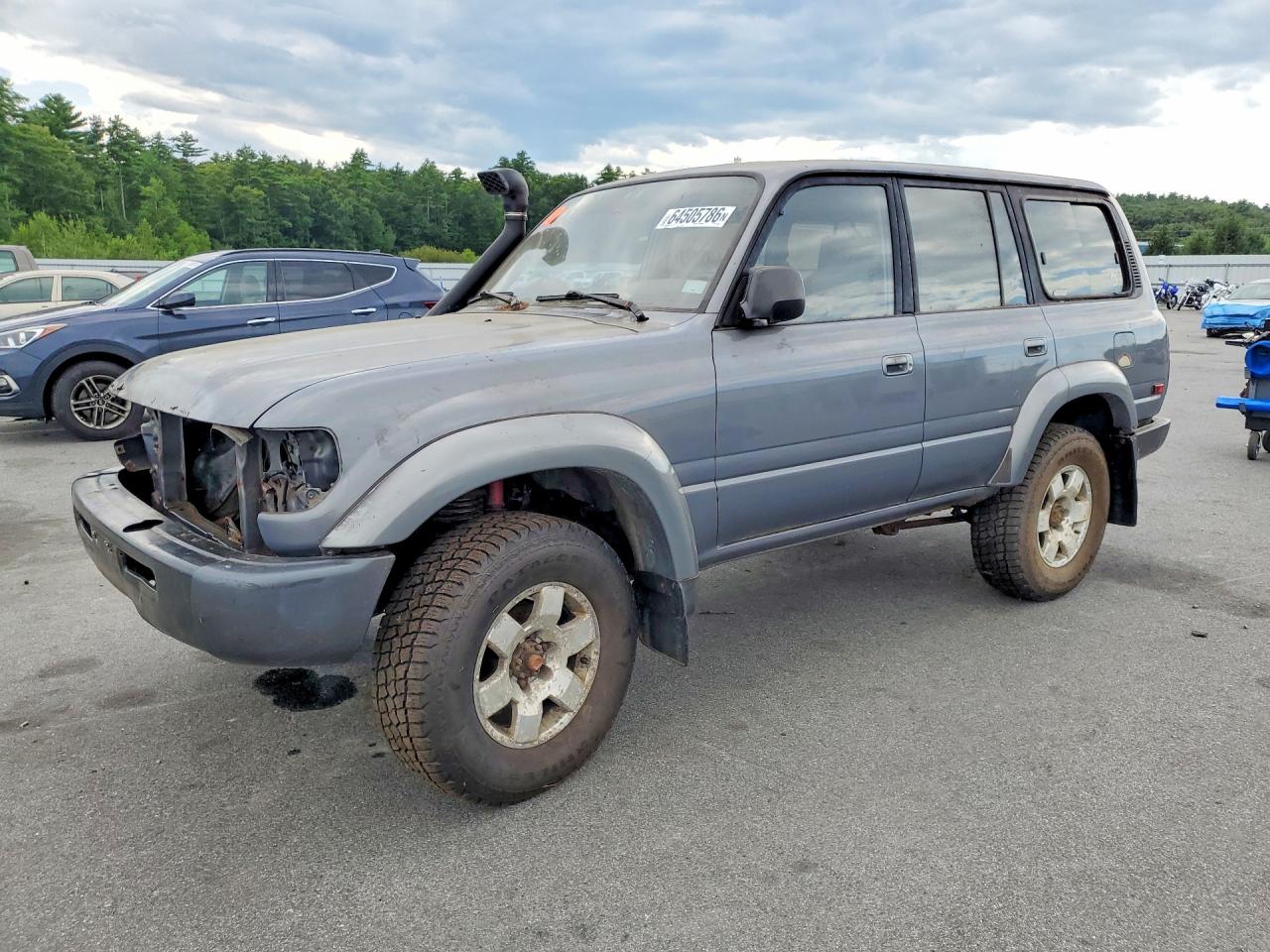 1995 Toyota Land Cruiser, VIN JT3DJ81W3S0111195 — Front end