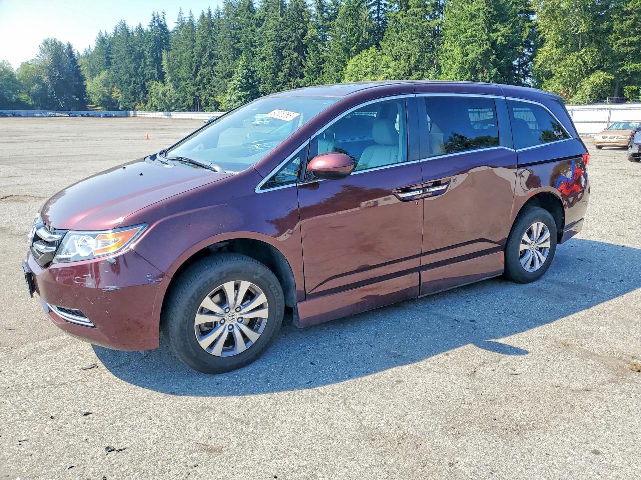 2014 Honda Odyssey EX-L, VIN 5FNRL5H66EB019018 — Бок