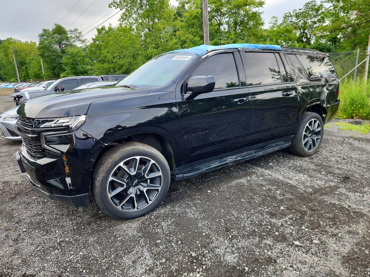 2023 Chevrolet Suburban RST, VIN 1GNSKEKD0PR533494 — Rollover