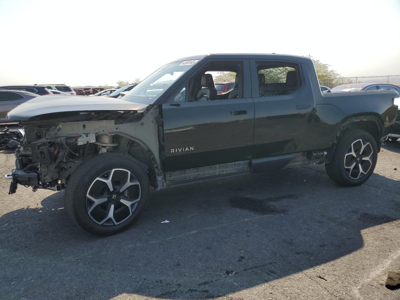 2023 Rivian R1T Adventure, VIN 7FCTGBAA5PN028055 — Front end