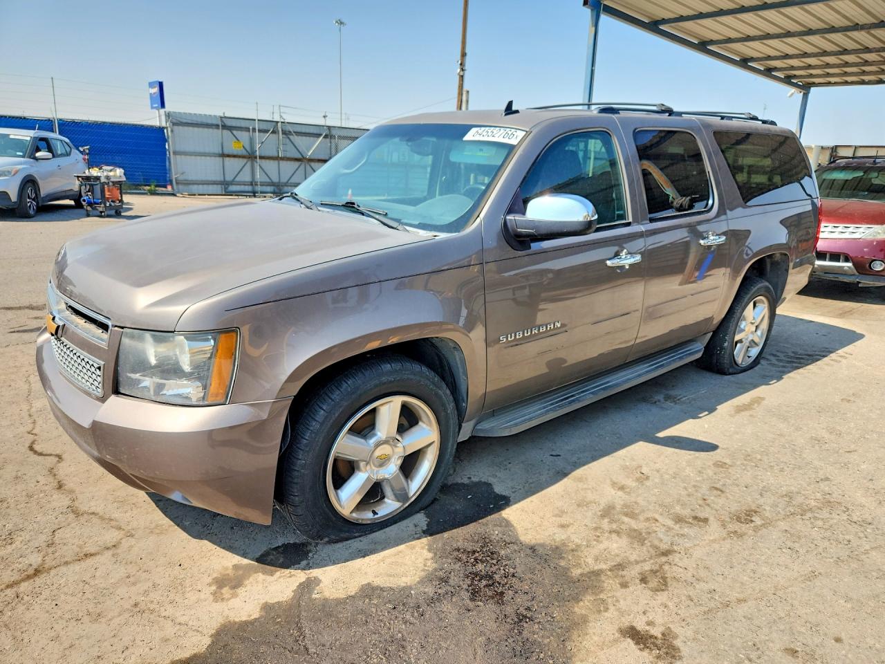 2014 Chevrolet Suburban LS, VIN 1GNSCHE03ER190328 — Side