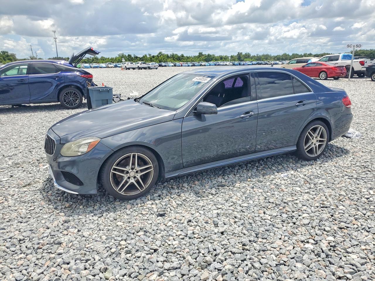 2014 Mercedes-Benz E 350 Sport, VIN WDDHF5KB3EB002520 — Minor dents and scratches