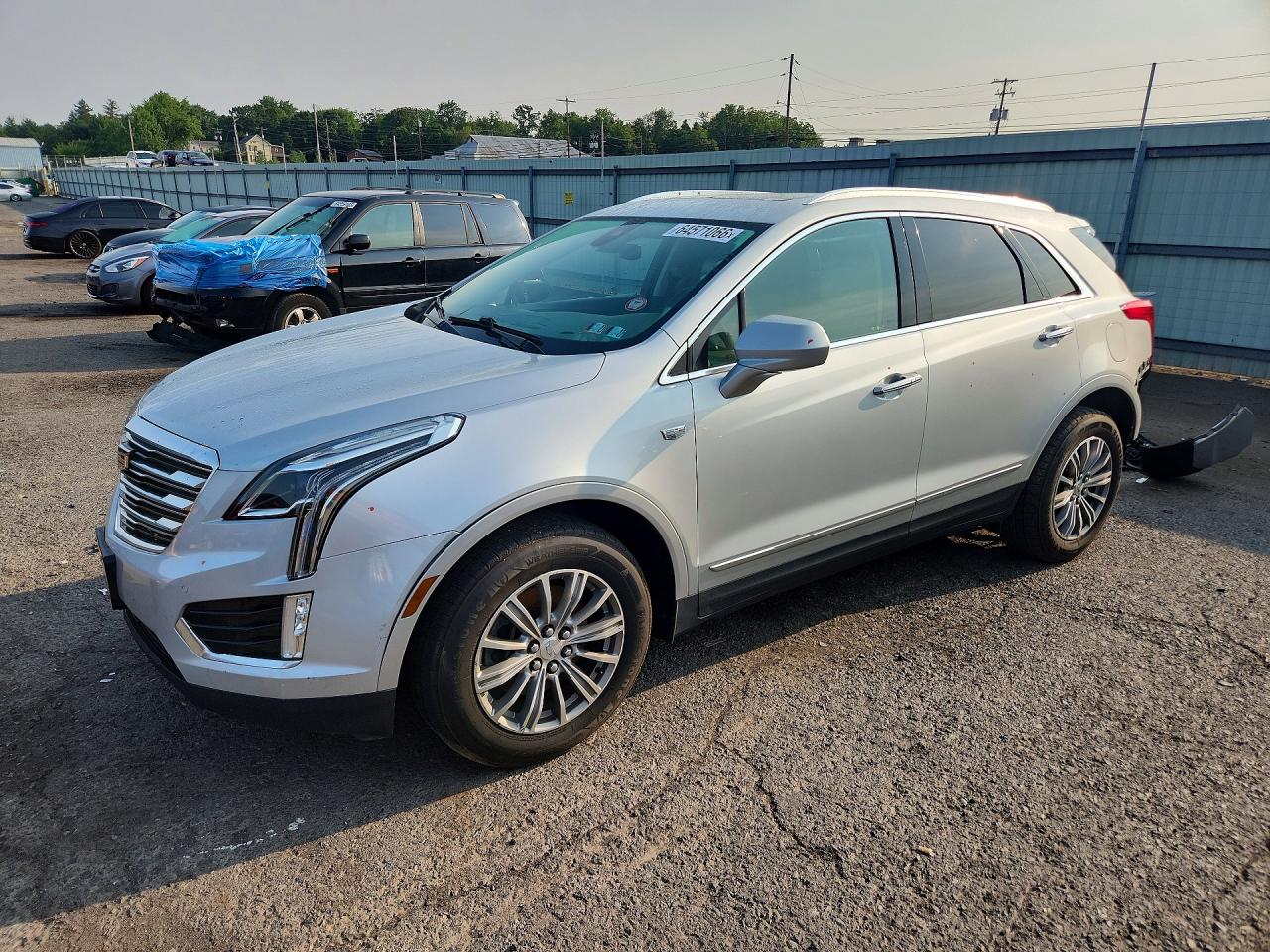 2017 Cadillac XT5 Luxury FWD, VIN 1GYKNBRS9HZ119256 — Зад