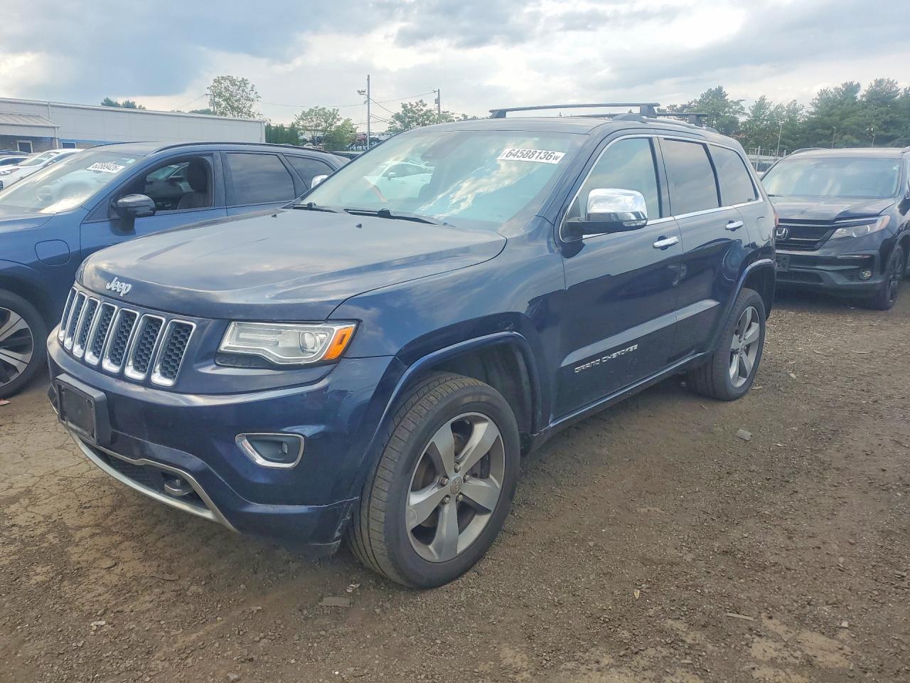 2014 Jeep Grand Cherokee Overland, VIN 1C4RJFCT2EC518369 — Мелкие вмятины и царапины