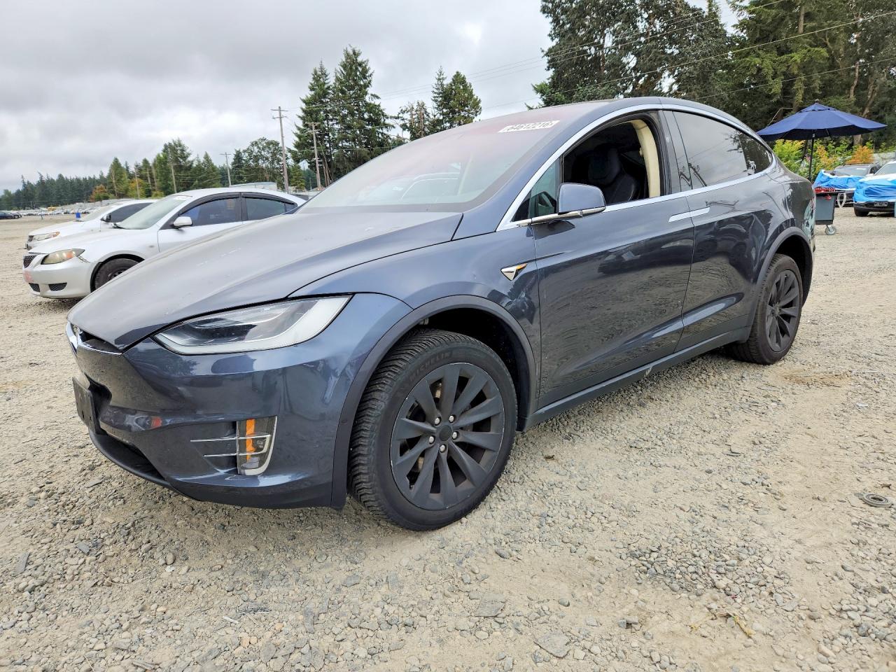 2016 Tesla Model X 70D, VIN 5YJXCDE23GF025798 — Rear end