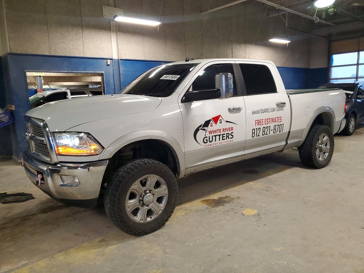 2014 Ram 2500 Laramie, VIN 3C6UR5FJ9EG119499 — Механическое