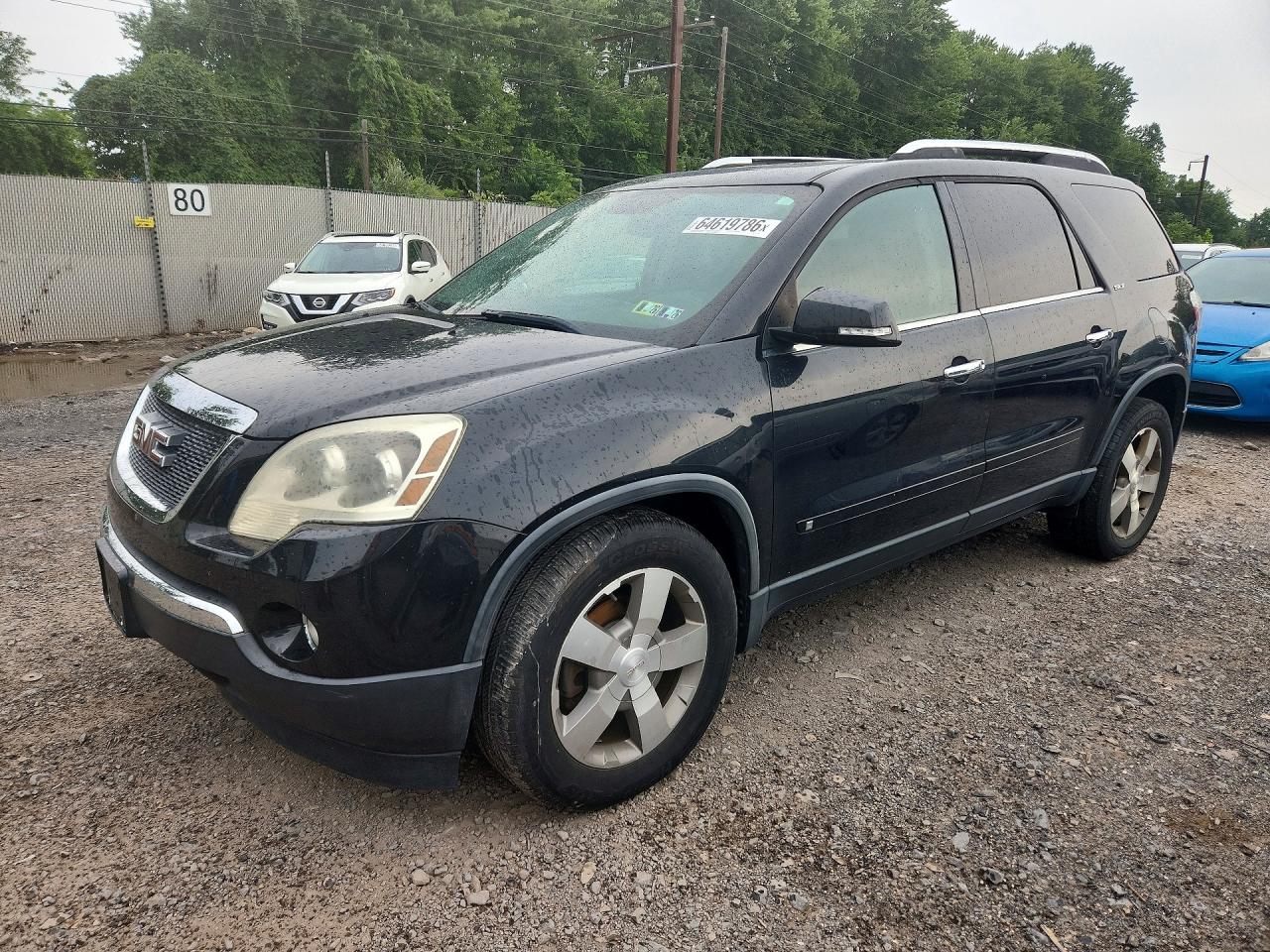 2009 GMC Acadia SLT1, VIN 1GKEV23D29J214744 — Side