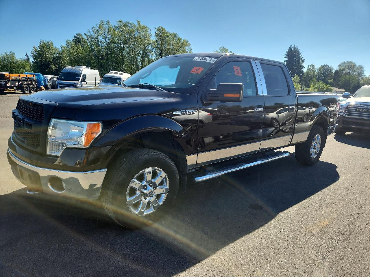 2014 Ford F-150 XL, VIN 1FTFW1EFXEKD74851 — Vandalism
