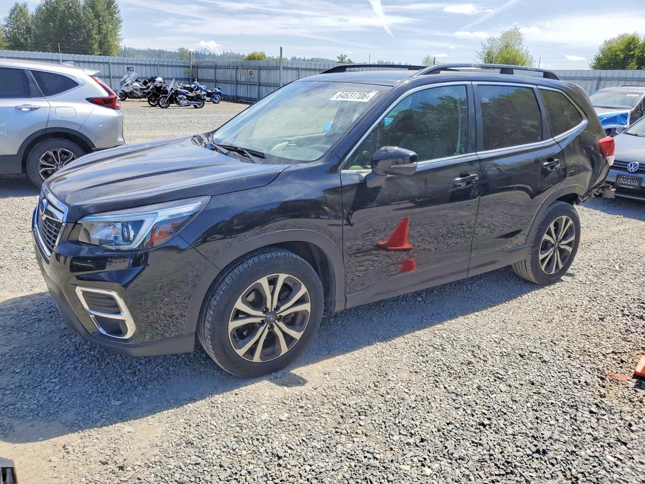 2019 Subaru Forester Limited, VIN JF2SKAUC3KH556967 — Rear end