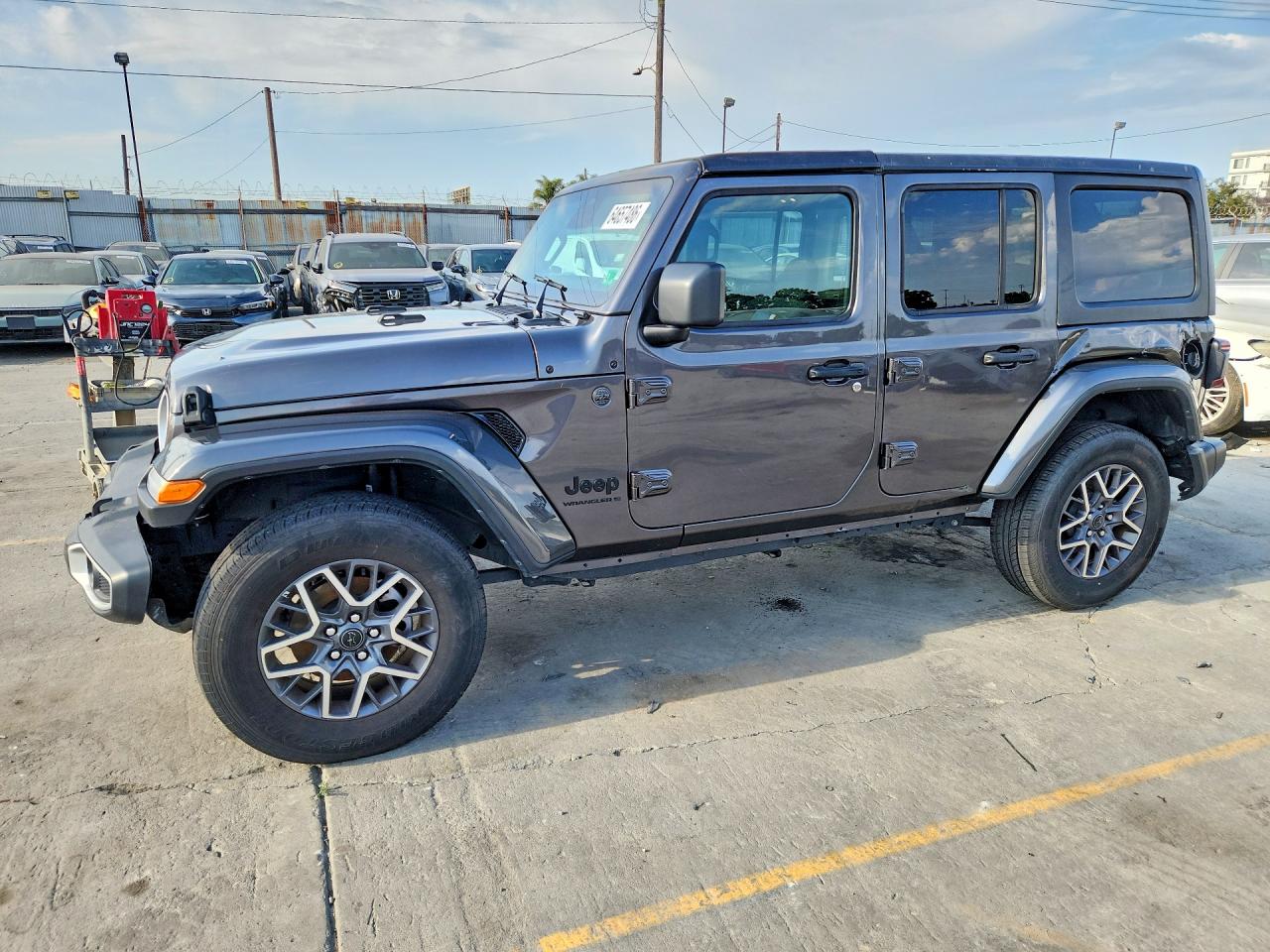 2025 Jeep Wrangler Sahara, VIN 1C4PJXEN3SW574018 — Rear end
