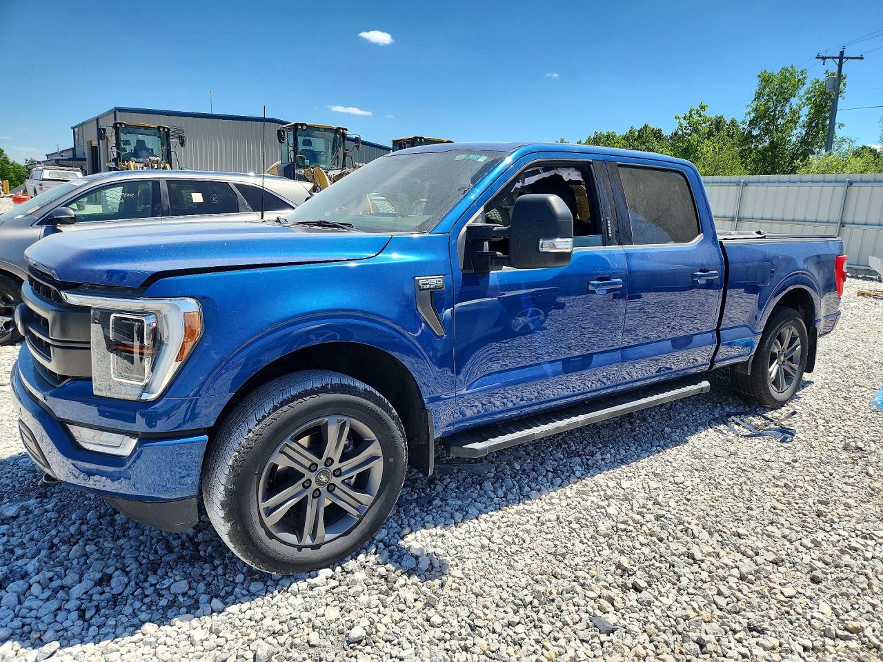 2023 Ford F-150 Lariat, VIN 1FTFW1E86PKD13128 — Side