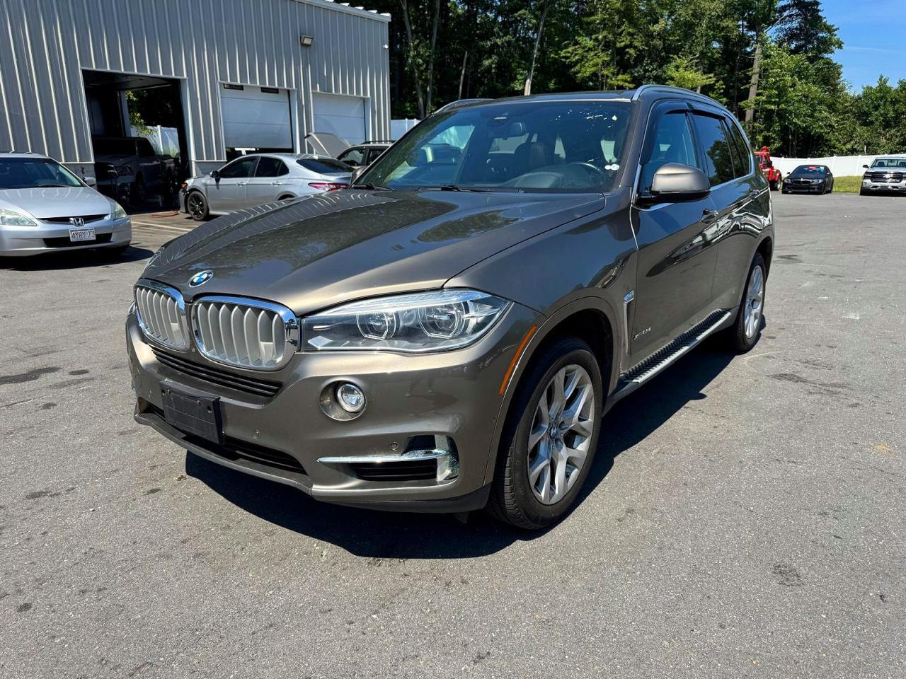 2018 BMW X5 xDrive50i, VIN 5UXKR6C58J0U15446 — Minor dents and scratches