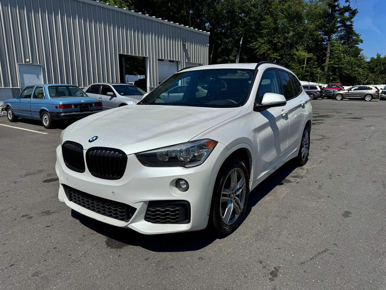 2018 BMW X1 sDrive28i, VIN WBXHU7C33J5L09376 — Minor dents and scratches