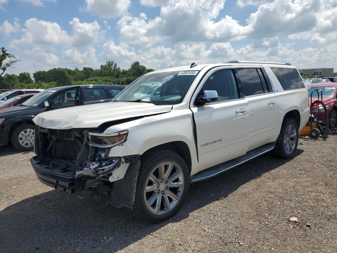 2015 Chevrolet Suburban LTZ, VIN 1GNSKKKC2FR143596 — Front end