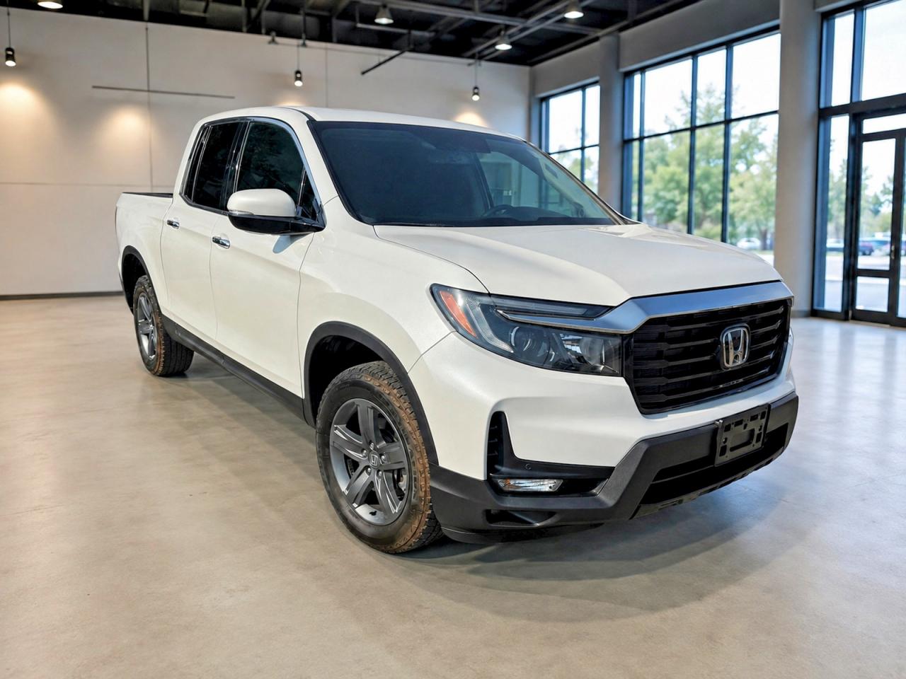 2022 Honda Ridgeline RTL-E, VIN 5FPYK3F75NB029741 — Minor dents and scratches