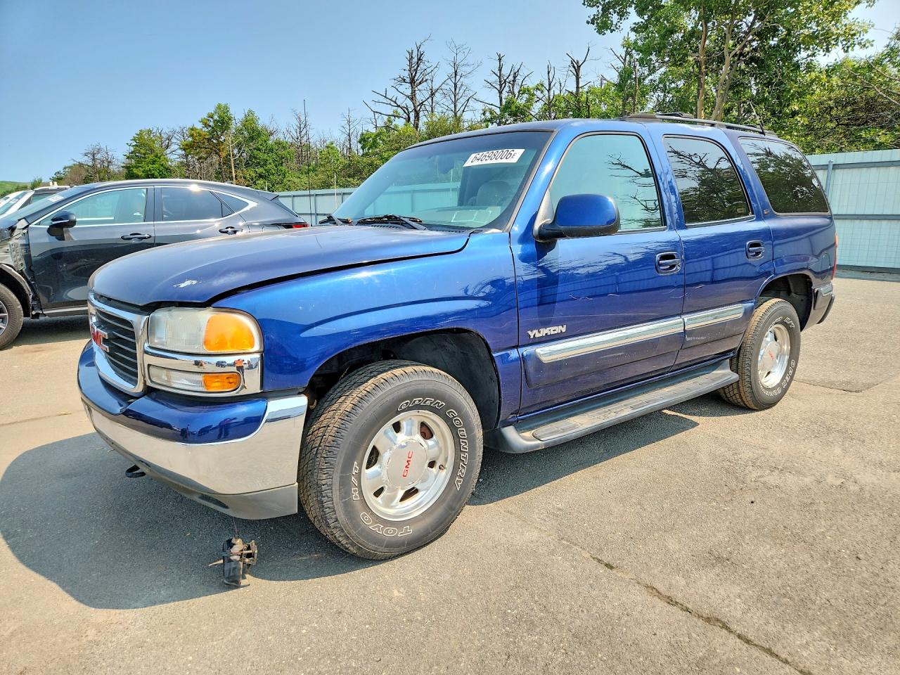2001 GMC Yukon SLE, VIN 1GKEK13T51J145076 — Minor dents and scratches