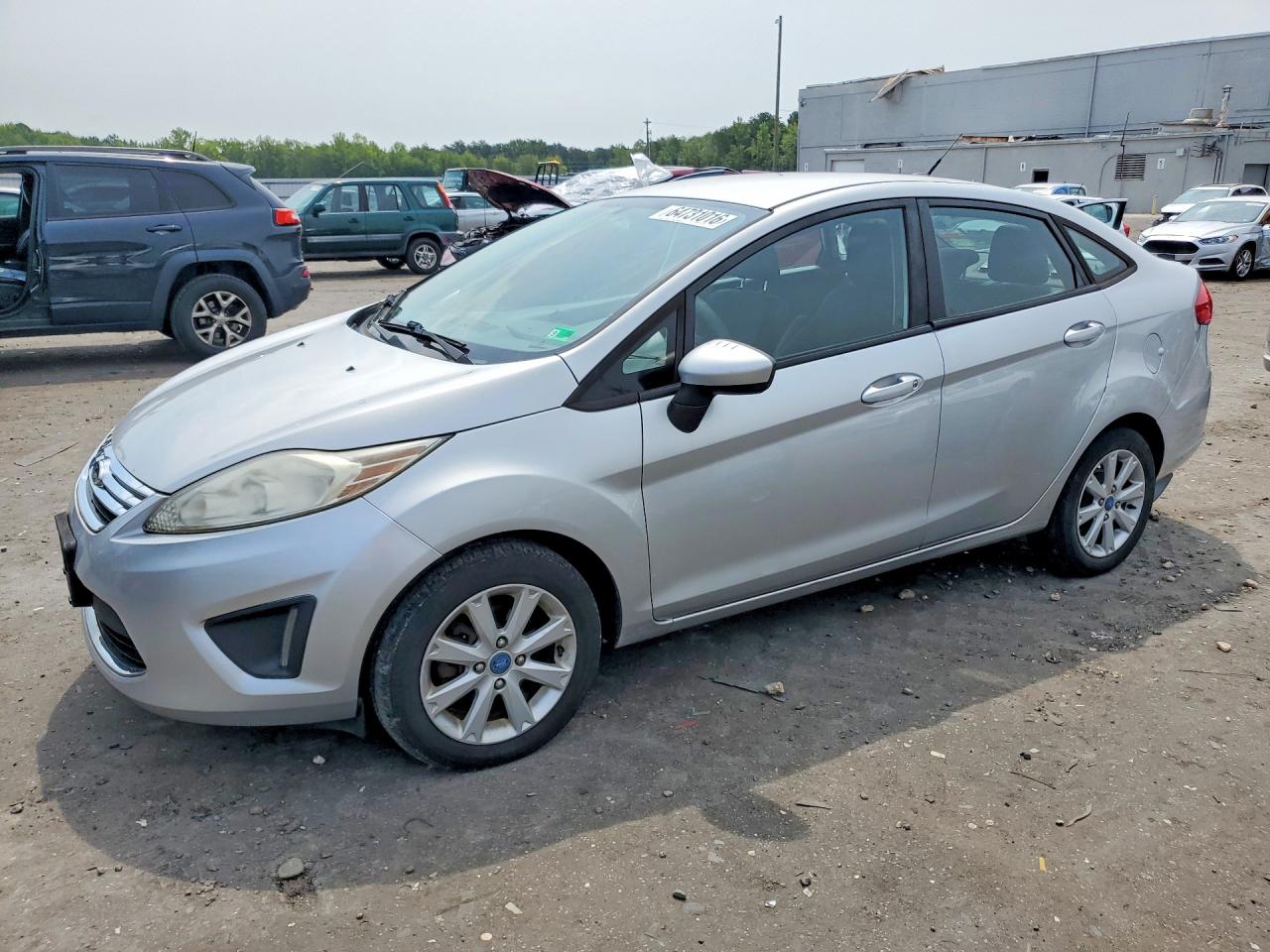 2012 Ford Fiesta SE, VIN 3FADP4BJ7CM101909 — Minor dents and scratches