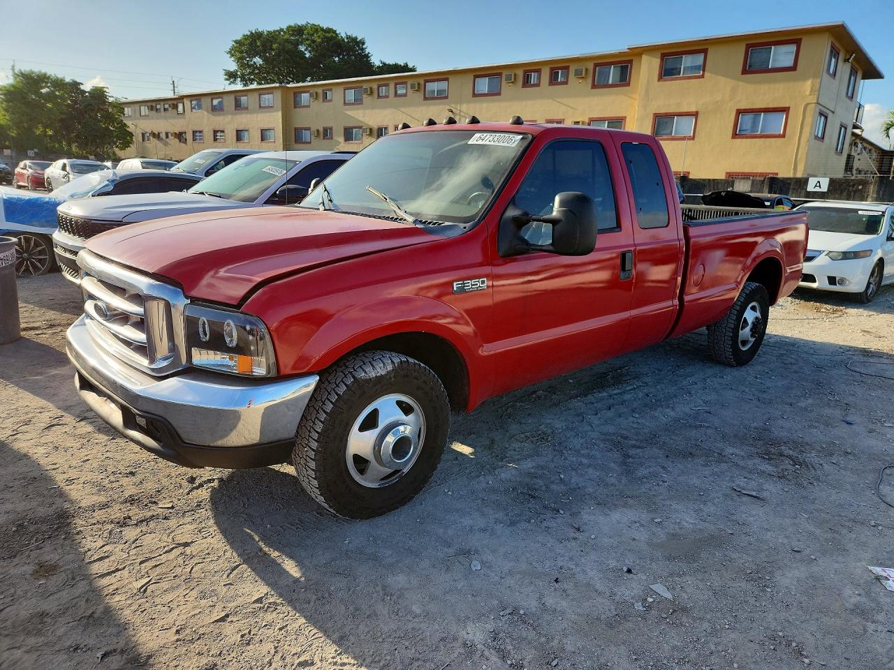 1999 Ford F-350 XL, VIN 1FTWX32F3XEA24203 — Minor dents and scratches