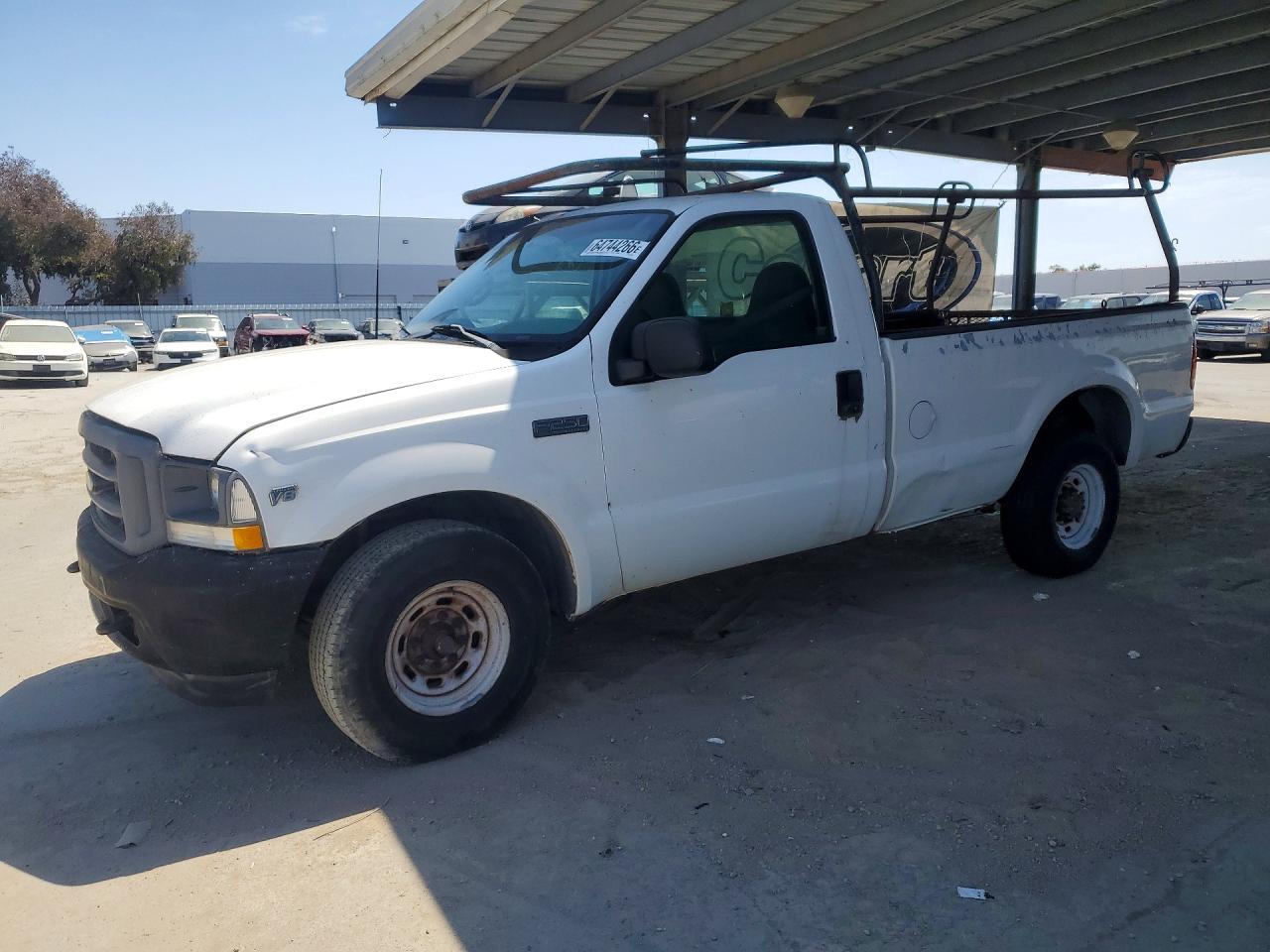 2002 Ford F-250 XL, VIN 1FTNF20L02EA17719 — Side