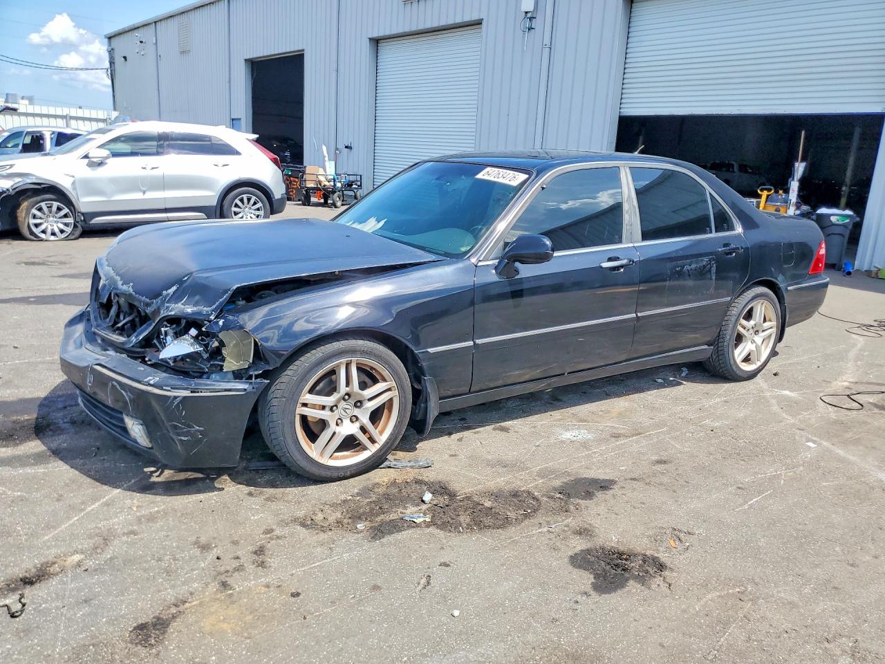 2002 Acura RL, VIN JH4KA96532C013287 — Front end