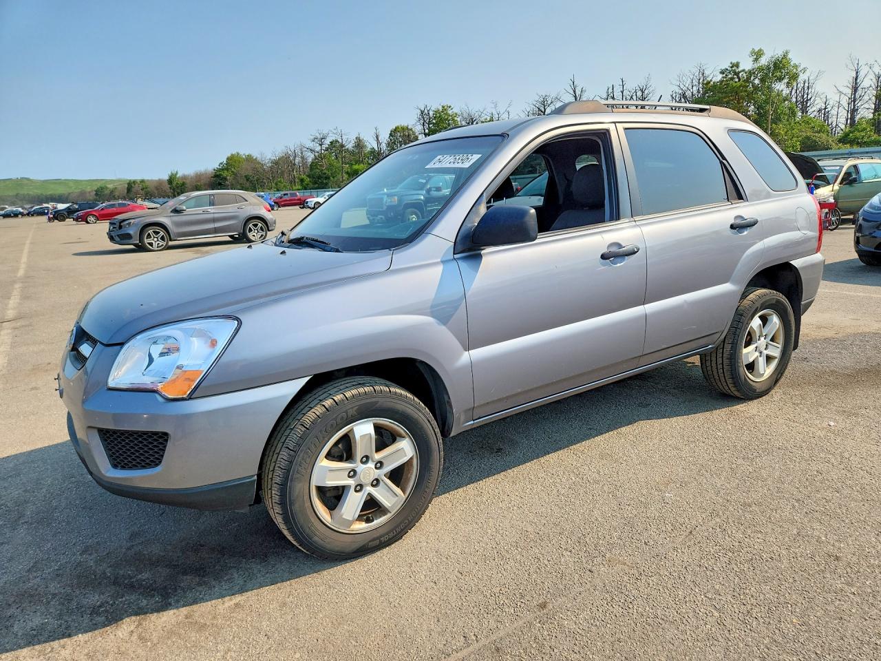2009 Kia Sportage LX, VIN KNDJE723997584022 — Minor dents and scratches