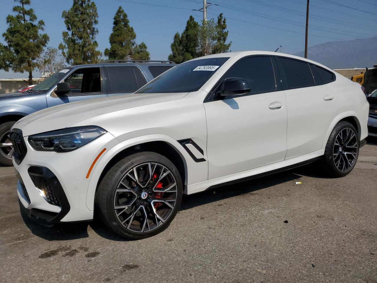2022 BMW X6 M, VIN 5YMCY0C01N9M56990 — Replaced VIN