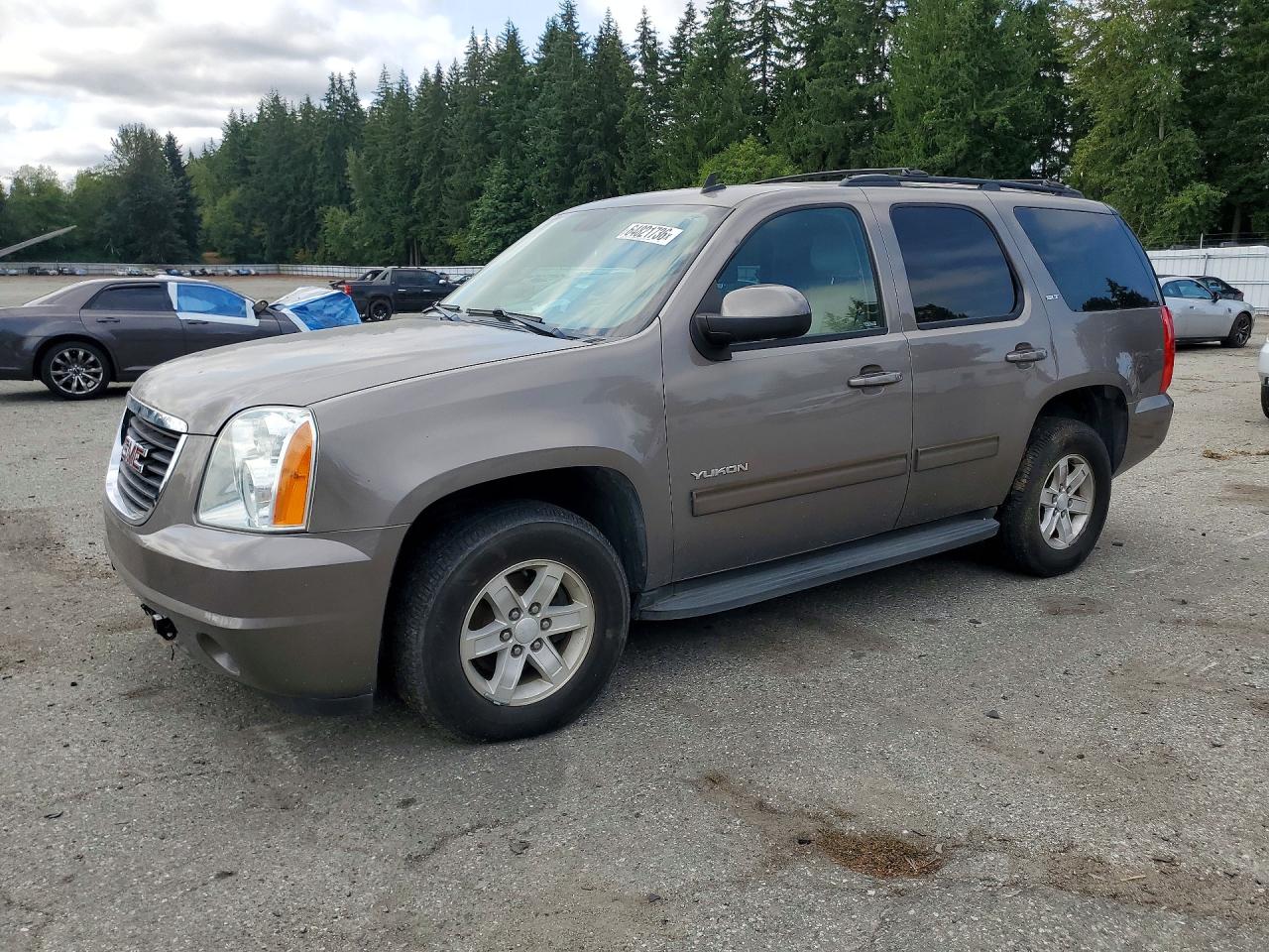 2011 GMC Yukon SLT, VIN 1GKS2CE01BR238178 — Minor dents and scratches