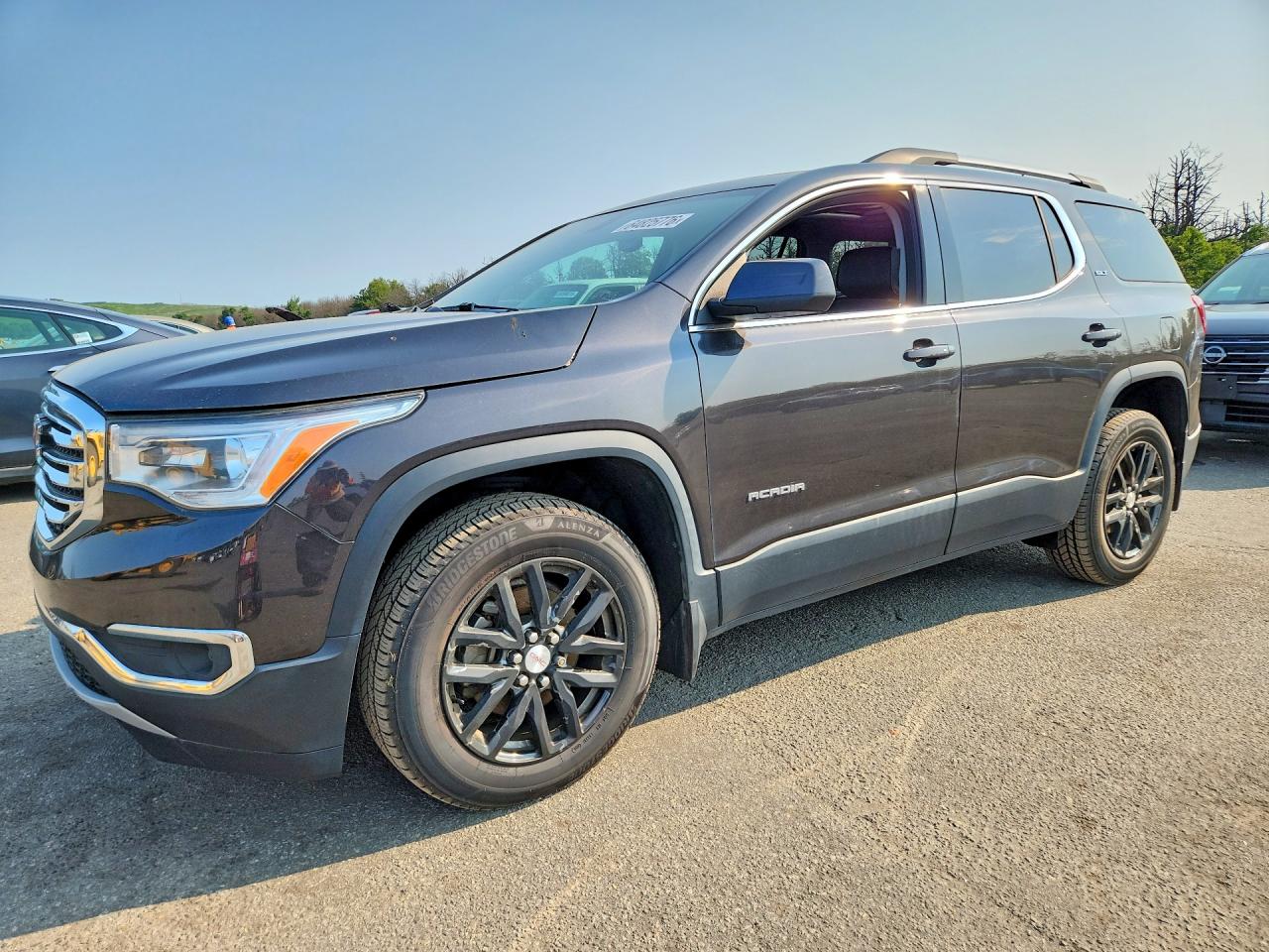 2018 GMC Acadia SLT, VIN 1GKKNULS8JZ222009 — Rear end