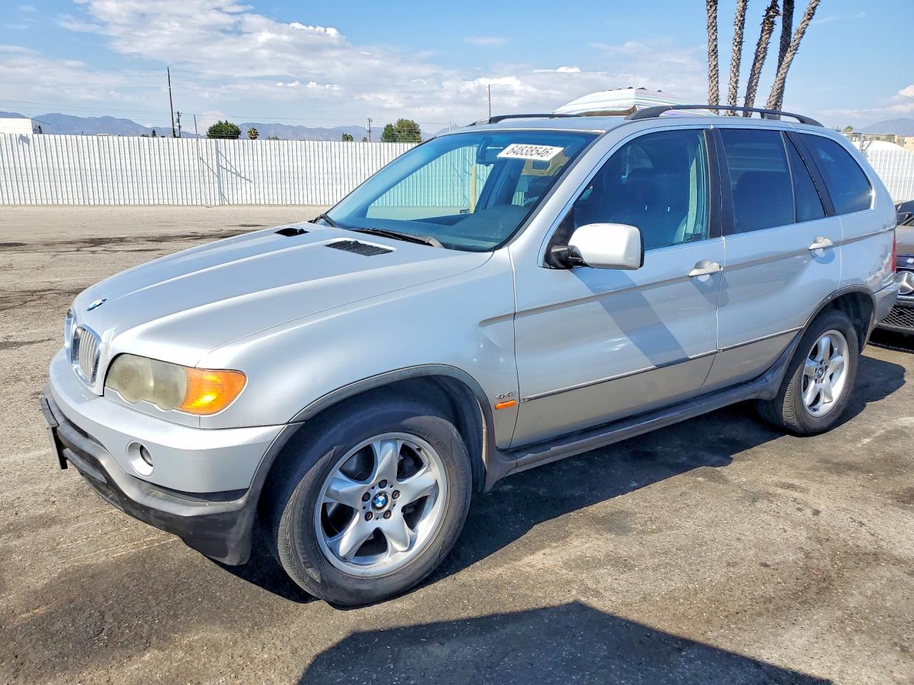 2000 BMW X5 4.4i, VIN WBAFB3357YLH05577 — Бок