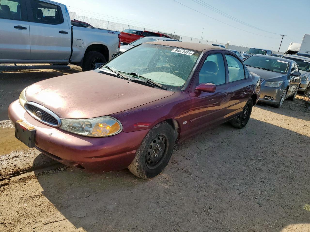 1999 Ford Contour LX, VIN 1FAFP66L2XK167281 — Minor dents and scratches
