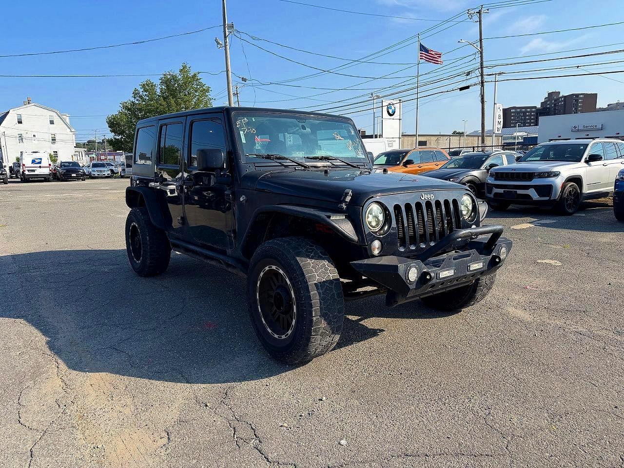 2016 Jeep Wrangler Unlimited Sport, VIN 1C4BJWDG3GL194273 — Normal wear