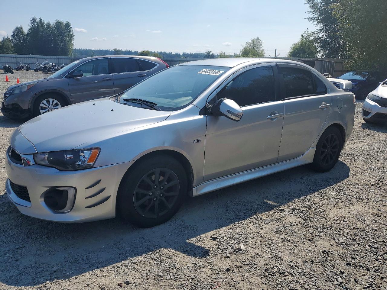 2017 Mitsubishi Lancer ES, VIN JA32U2FU4HU005031 — Бок