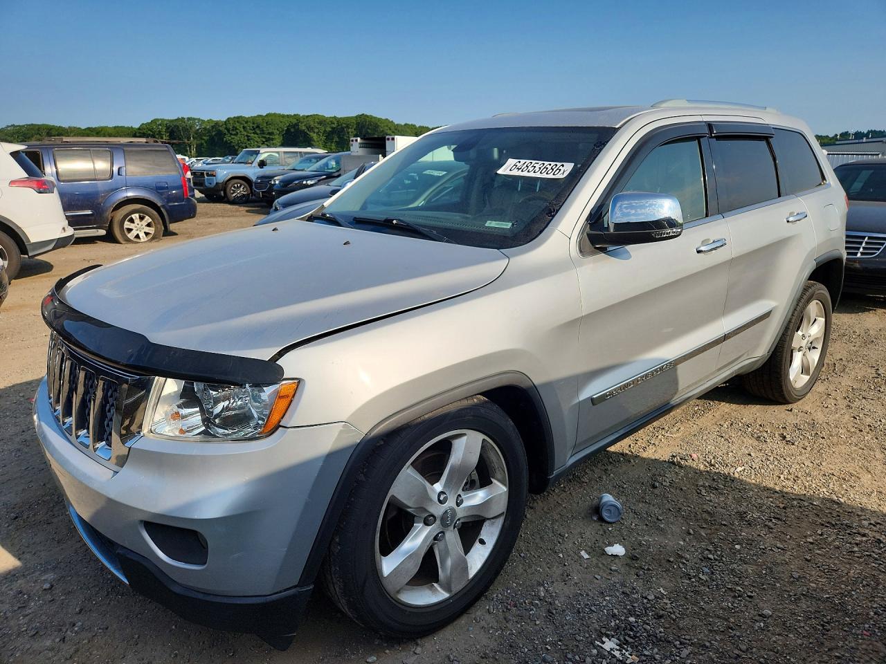 2011 Jeep Grand Cherokee Overland Summit, VIN 1J4RR6GT1BC629407 — Minor dents and scratches