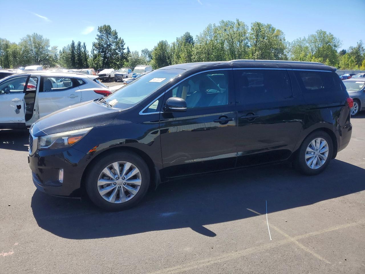 2015 Kia Sedona EX, VIN KNDMC5C12F6047708 — Бок