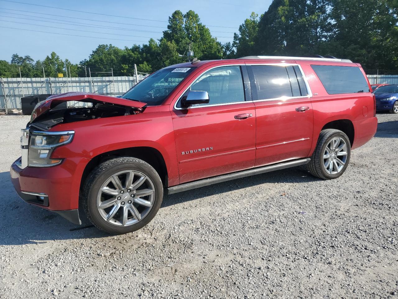 2015 Chevrolet Suburban LTZ, VIN 1GNSKKKC1FR247755 — Front end