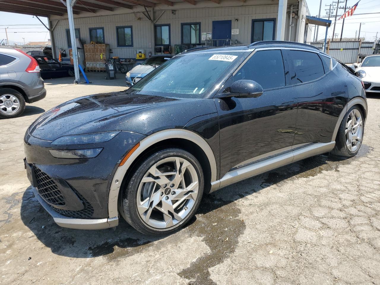 2023 Genesis GV60 Performance, VIN KMUKEDTB6PU006352 — Rear end
